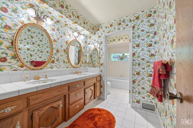 7858 Stine Rd, Bakersfield, CA 93313 - bathroom featuring visible vents, a sink, toilet, wallpapered walls, and tile patterned flooring
