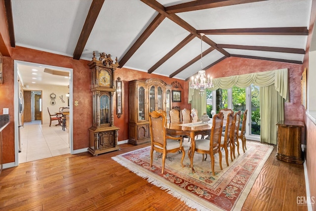 7858 Stine Rd, Bakersfield, CA 93313 - dining room featuring vaulted ceiling with beams, a chandelier, and light wood-style floors