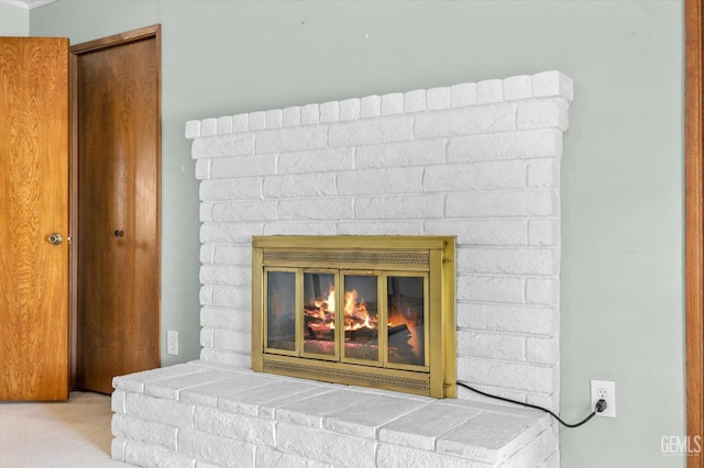 7858 Stine Rd, Bakersfield, CA 93313 - room details featuring a fireplace and carpet flooring