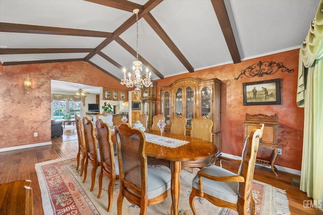 7858 Stine Rd, Bakersfield, CA 93313 - dining room featuring baseboards, vaulted ceiling with beams, wood finished floors, and ceiling fan with notable chandelier