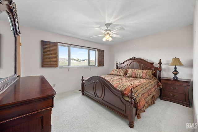 7858 Stine Rd, Bakersfield, CA 93313 - bedroom featuring light colored carpet and a ceiling fan