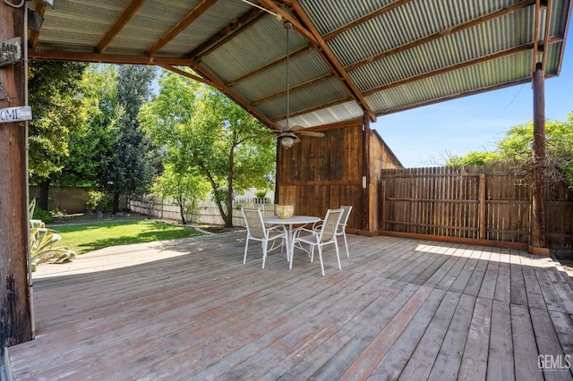 7858 Stine Rd, Bakersfield, CA 93313 - deck with a yard, outdoor dining area, and a fenced backyard
