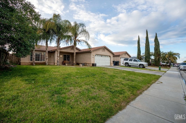 ranch-style home with stucco siding, a front yard, an attached garage, and driveway