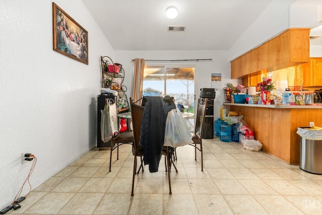 dining area featuring visible vents