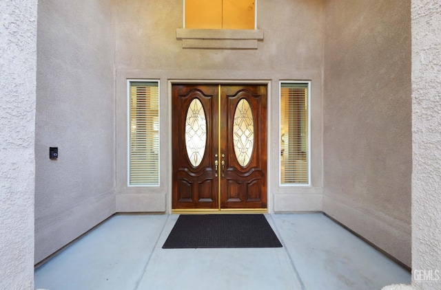 12504 Crown Crest Dr, Bakersfield, CA 93311 - doorway to property featuring stucco siding and french doors
