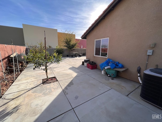 view of patio with cooling unit