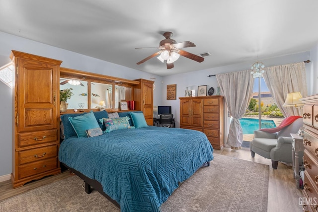 5512 Sicily Ct, Bakersfield, CA 93308 - bedroom featuring access to outside, light wood-style flooring, and a ceiling fan