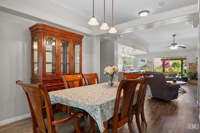 5512 Sicily Ct, Bakersfield, CA 93308 - dining area featuring dark wood finished floors, a ceiling fan, baseboards, crown molding, and a chandelier