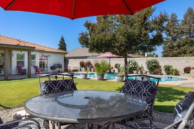 5512 Sicily Ct, Bakersfield, CA 93308 - view of patio featuring outdoor dining area and a grill