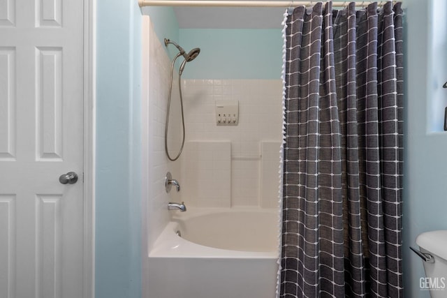 5512 Sicily Ct, Bakersfield, CA 93308 - bathroom featuring shower / bath combo with shower curtain and toilet