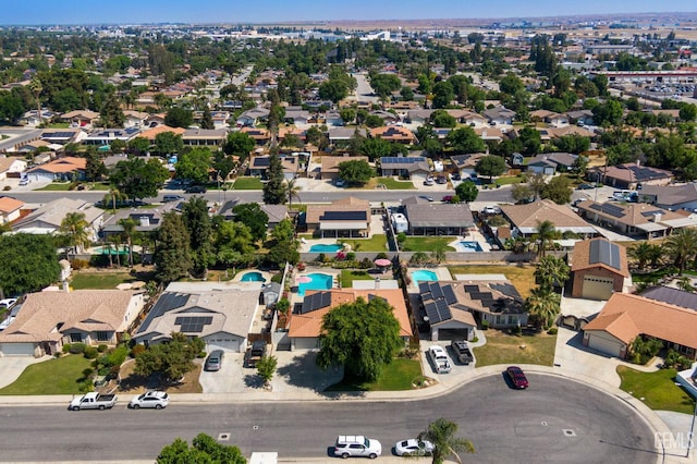 5512 Sicily Ct, Bakersfield, CA 93308 - aerial overview of property's location featuring a pool area and nearby suburban area