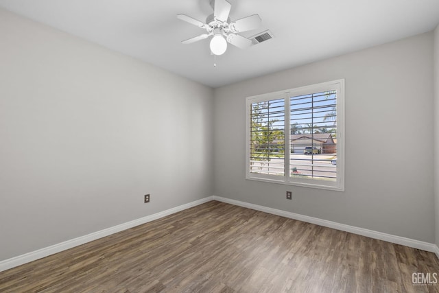 5512 Sicily Ct, Bakersfield, CA 93308 - empty room with wood finished floors, baseboards, and a ceiling fan