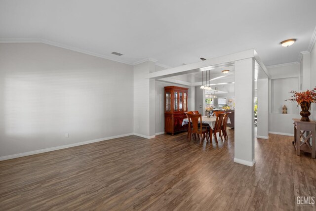 5512 Sicily Ct, Bakersfield, CA 93308 - dining space with wood finished floors, baseboards, and crown molding
