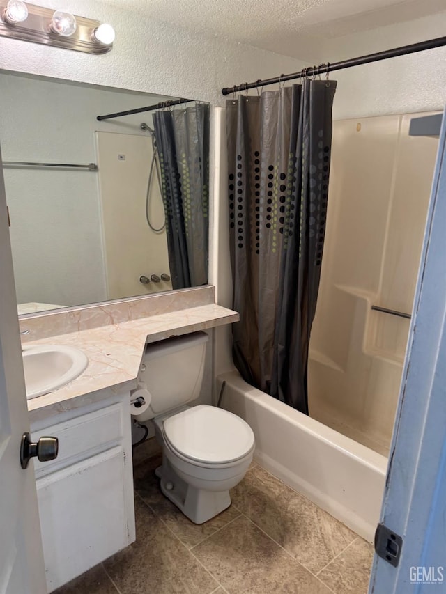 full bathroom with shower / bath combo, vanity, a textured ceiling, and toilet