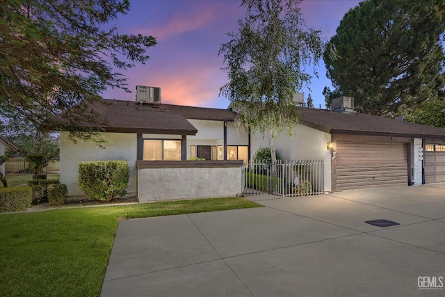 5600 Kirkside Dr Unit F, Bakersfield, CA 93311 - mid-century inspired home featuring driveway, stucco siding, central AC unit, and a garage
