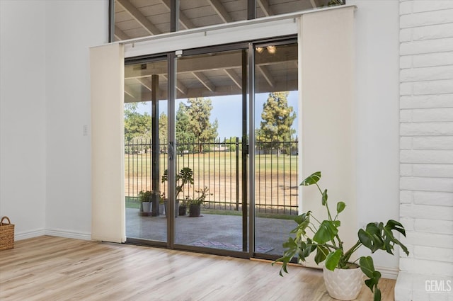 5600 Kirkside Dr Unit F, Bakersfield, CA 93311 - doorway with wood finished floors and baseboards