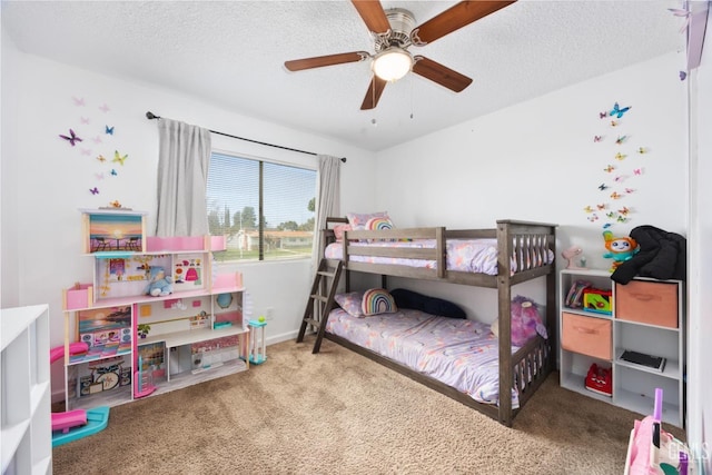 bedroom featuring carpet, ceiling fan, and a textured ceiling