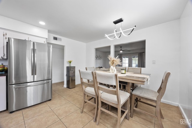 tiled dining space with french doors