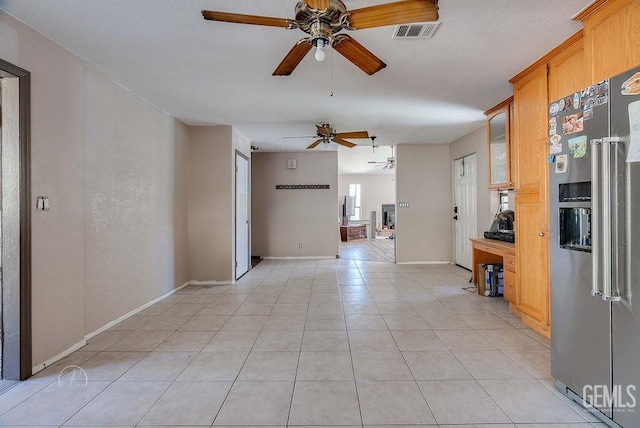 22381 William Tell Trl, Tehachapi, CA 93561 - empty room with a ceiling fan and light tile patterned flooring