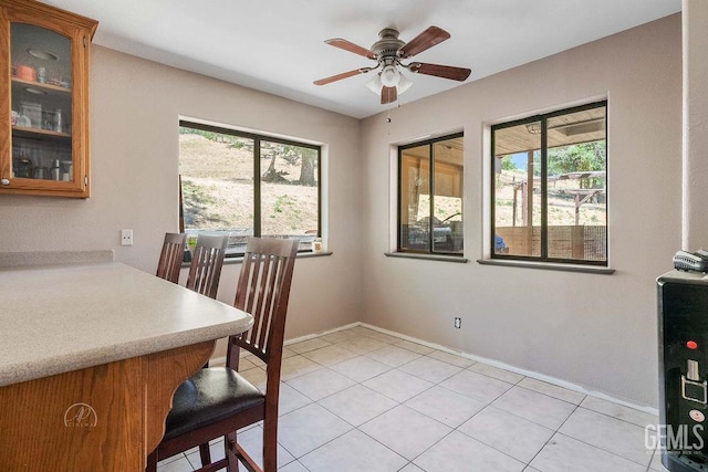 22381 William Tell Trl, Tehachapi, CA 93561 - dining area with a ceiling fan and light tile patterned floors