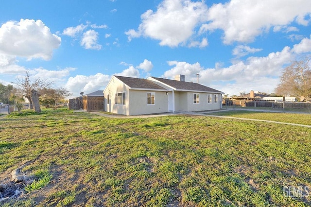 view of front of house with a front lawn