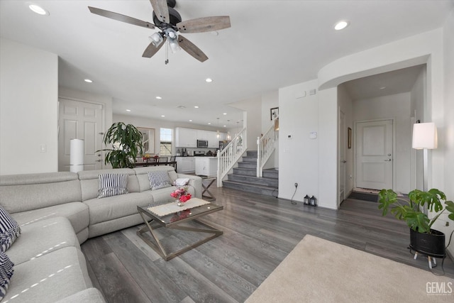 living room featuring stairway, recessed lighting, a ceiling fan, and wood finished floors