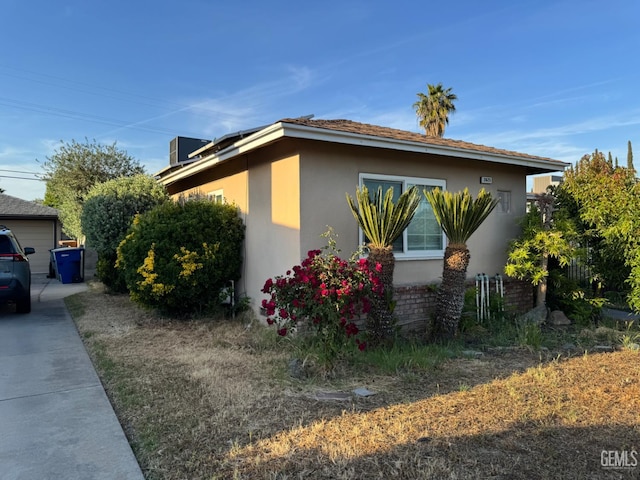 2625 E Michigan Ave, Fresno, CA 93703 - view of side of home featuring stucco siding