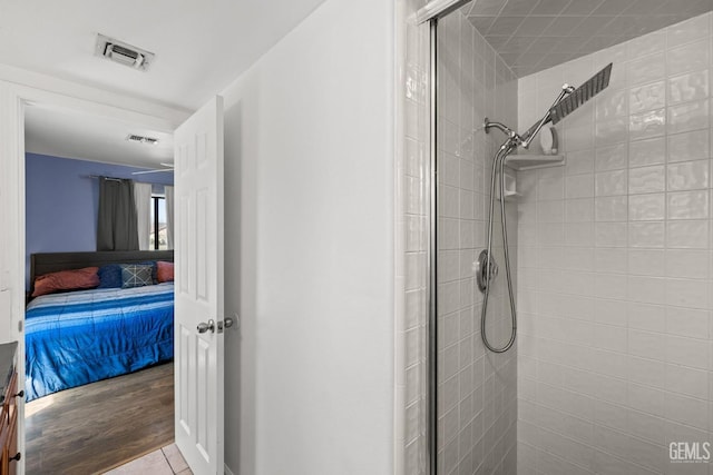 full bath with a stall shower, ensuite bath, and visible vents