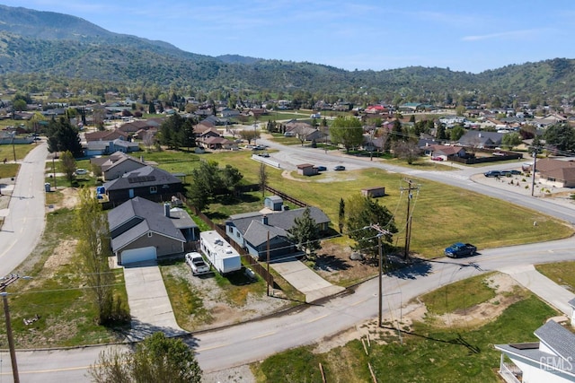 aerial view featuring a mountain view and a residential view