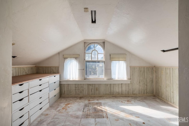 2104 B St, Bakersfield, CA 93301 - bonus room with lofted ceiling, wood walls, wainscoting, and baseboards