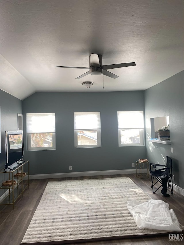 2104 B St, Bakersfield, CA 93301 - sitting room with ceiling fan, wood finished floors, baseboards, and lofted ceiling