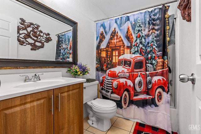 bathroom featuring toilet, vanity, tile patterned floors, and curtained shower