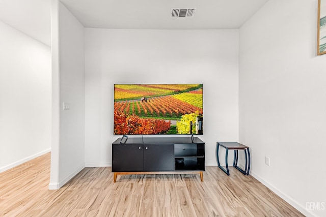 interior space with hardwood / wood-style floors