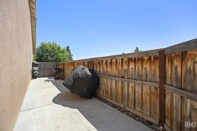 9318 Poseidon St, Bakersfield, CA 93306 - fenced backyard featuring a patio
