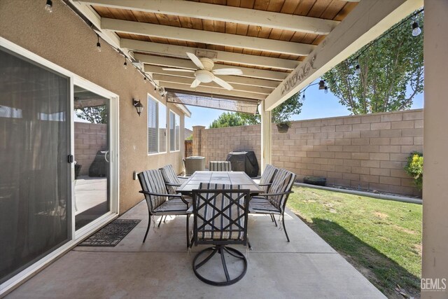 9318 Poseidon St, Bakersfield, CA 93306 - fenced backyard with ceiling fan, outdoor dining space, a patio area, and grilling area