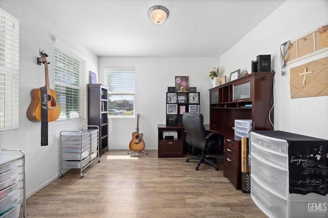 9318 Poseidon St, Bakersfield, CA 93306 - office area featuring wood finished floors and baseboards