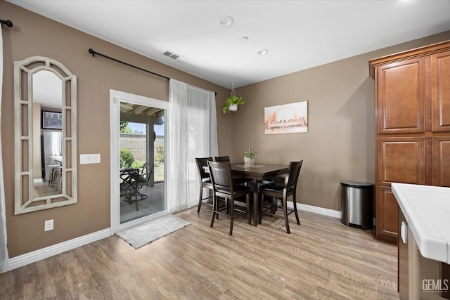 9318 Poseidon St, Bakersfield, CA 93306 - dining space featuring light wood-style floors and recessed lighting