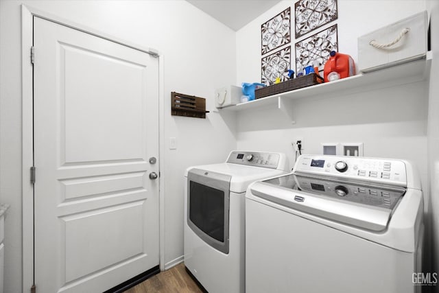 9318 Poseidon St, Bakersfield, CA 93306 - laundry room featuring washing machine and clothes dryer and dark wood-style flooring