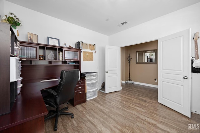 9318 Poseidon St, Bakersfield, CA 93306 - office featuring wood finished floors and baseboards
