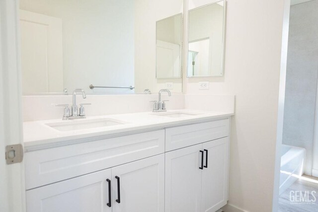16615 Chloe Ct, Bakersfield, CA 93314 - full bath with a sink, a bathtub, and double vanity