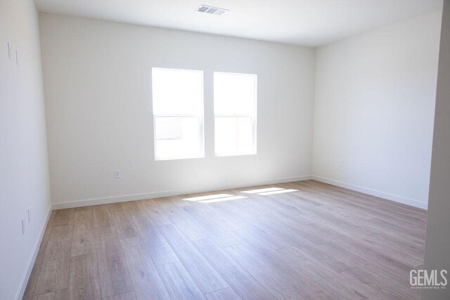 16615 Chloe Ct, Bakersfield, CA 93314 - spare room featuring baseboards, visible vents, and light wood-style flooring