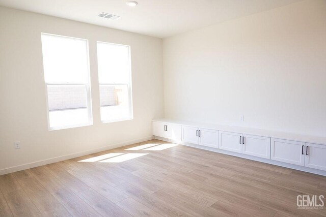16615 Chloe Ct, Bakersfield, CA 93314 - spare room with baseboards, visible vents, and light wood-style floors
