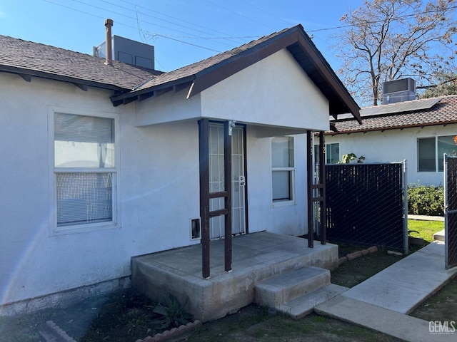 entrance to property with central air condition unit