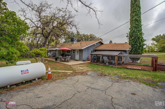 view of front of house featuring a patio