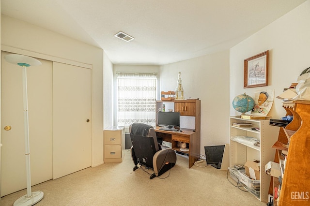 office space with carpet flooring and visible vents