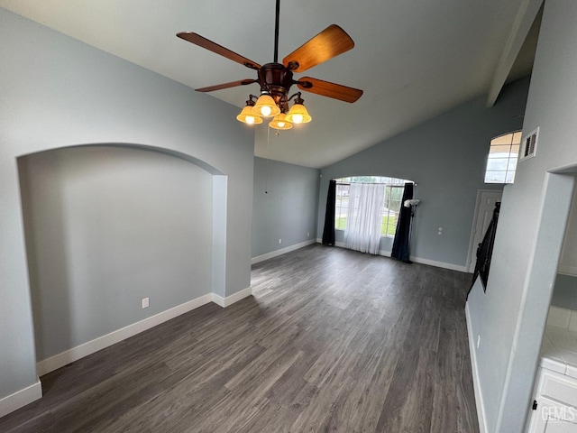 6100 Aruba Ct, Bakersfield, CA 93313 - unfurnished living room featuring visible vents, dark wood-type flooring, a ceiling fan, arched walkways, and baseboards