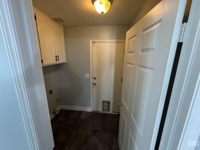 6100 Aruba Ct, Bakersfield, CA 93313 - laundry area featuring visible vents, baseboards, cabinet space, dark wood-style flooring, and electric dryer hookup