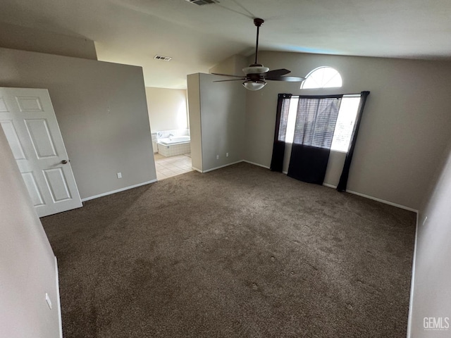 6100 Aruba Ct, Bakersfield, CA 93313 - empty room featuring carpet, vaulted ceiling, a ceiling fan, and visible vents