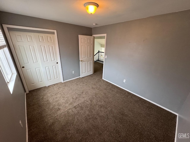 6100 Aruba Ct, Bakersfield, CA 93313 - unfurnished bedroom with carpet, a closet, and baseboards