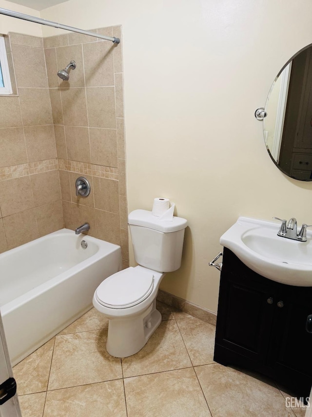 full bathroom featuring toilet, tile patterned floors, tub / shower combination, and vanity